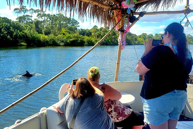 2 hour Dolphin Sightseeing Tour in Melbourne Florida - Tiki Boat Comfort: 35 Feet, Up to 23, and Shade That Matters