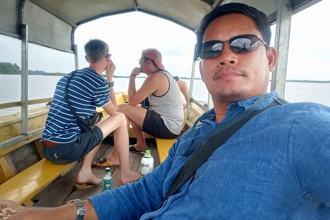 4 hours taking tuk tuk to see Mekong dolphins and countryside - Price and logistics: $20 tour, then plan for the $10 boat ticket