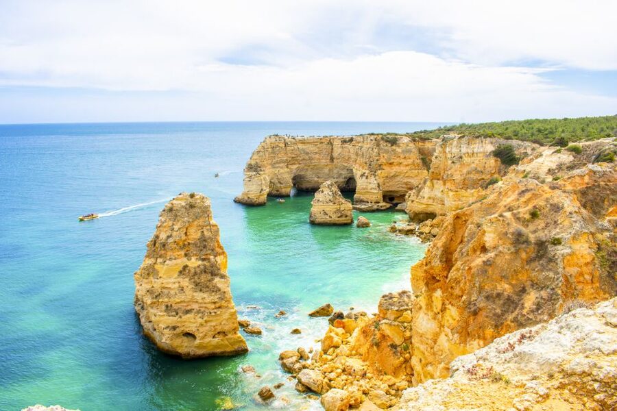 Albufeira: Benagil Caves & Dolphin Watching Speed Boat Tour - The optional swim stop: crystal-clear water when the sea cooperates