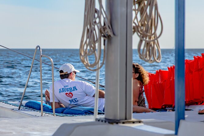 Aruba Sunset Sail Cruise Aboard The Dolphin Catamaran - Boarding via shuttle boat: the step that can make or break the mood