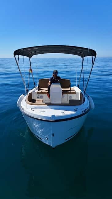 Benalmádena: license-Free Rent Boat for Dolphin Watching - Your onboard comfort kit: solarium, fridge, shade, and music