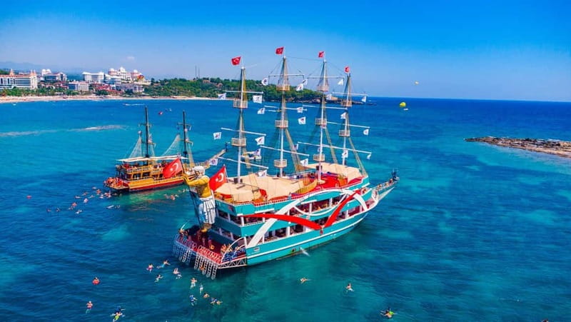 City Of Side: Dolphin Island Boat or Side Boat Tour Options - Languages and Guides: You’ll Likely Find Someone Who Can Explain the Plan