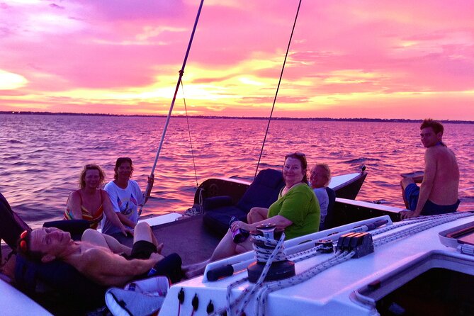 Condor Sailing Fun, Relaxing Public Dolphin & Sightseeing Cruise - Stop One: Fort Pickens views and side-seating with foot-dangling energy