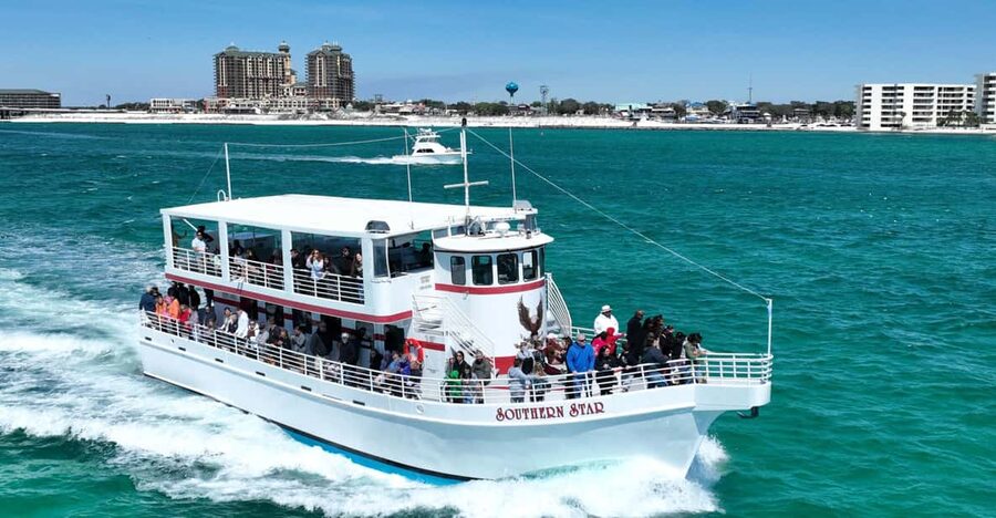 Destin: Dolphin Cruise aboard a Glass-Bottom Boat - Leaving Destin Harbor: the captain’s live commentary makes it smarter