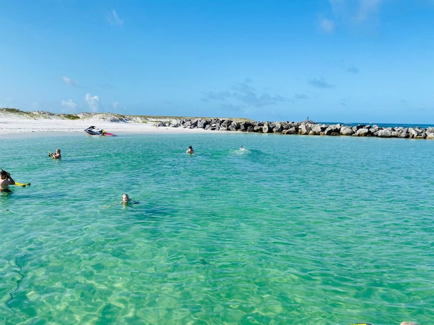 Destin: Snorkeling Cruise with 2 Stops and Dolphin Watching - Snorkeling Stop #2: Fish Feeding and the Crab-Spotting Moment