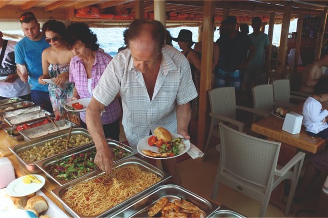 Dolphin Island Boat Trip – Swim, Sun & Lunch Included - Dolphin and turtle chances: manage expectations like a pro