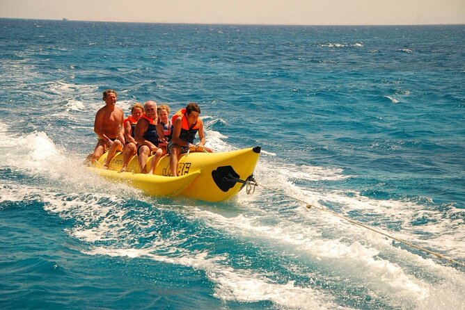 Dolphin tour & banana boat fun with snorkeling from Hurghada - Banana boat and sofa boat fun: weather decides if you get the extra ride