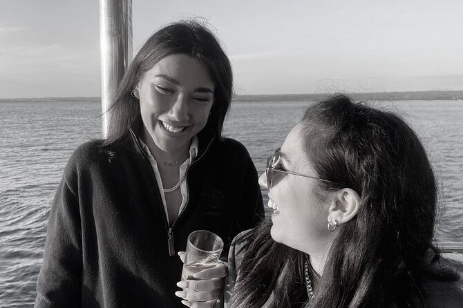 Dolphin Watching & Sunset Boat Tour With Dinner and Drinks - Dinner and Unlimited Drinks: Simple, Solid, and Mobile