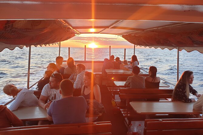 Dolphin Watching Sunset Boat Trip in Pula with Dinner - Key highlights worth planning for