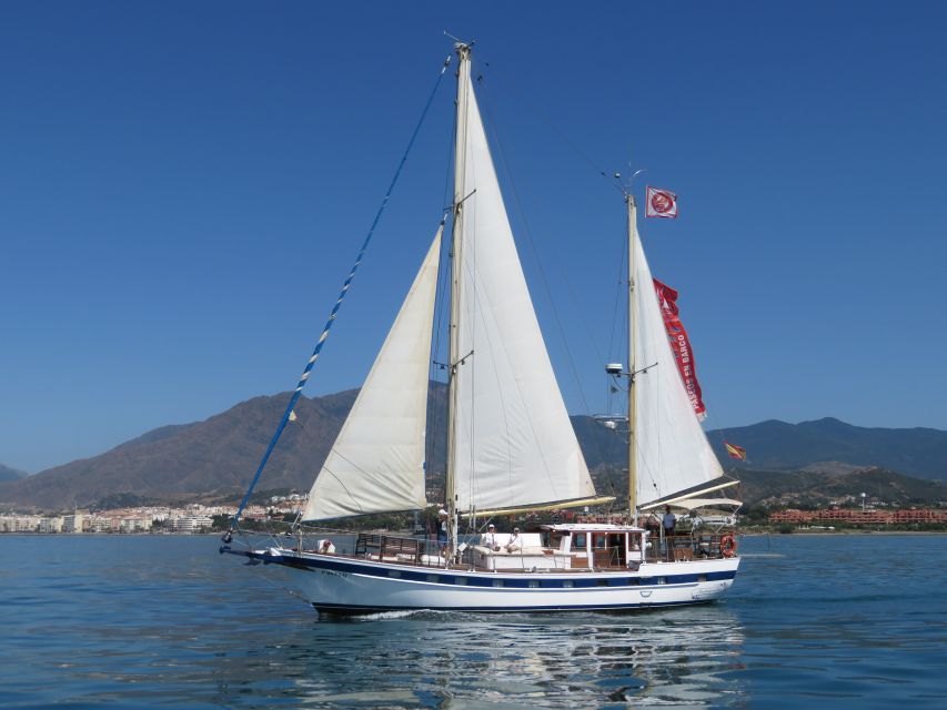 Estepona: Dolphin Watching Sailboat Cruise with Drink - Getting there: Pontoon 6, Puerto de Estepona, and the red flag