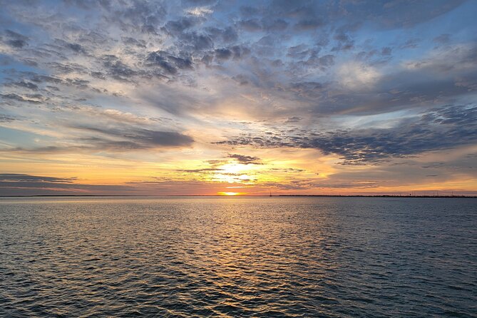 Fireworks Cruise with Dolphin Watch in Laguna Madre Bay - The Murphy’s Law Party Boat Reality Check: Music, Dancing, and Noise
