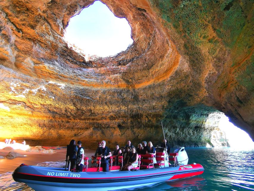 From Albufeira: Benagil Caves and Dolphins Guided Boat Tour - The coastline between Albufeira and Benagil: rock formations and real stories