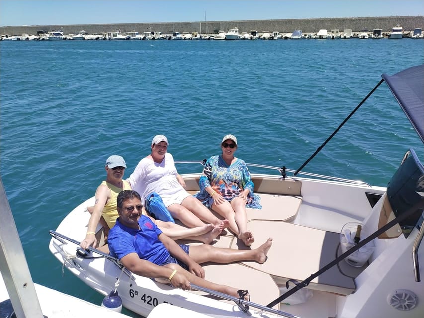 Fuengirola: Dolphin Watching Tour with Snacks and Drinks - On-board comfort: modern boat, cozy feel, and drinks you’ll use