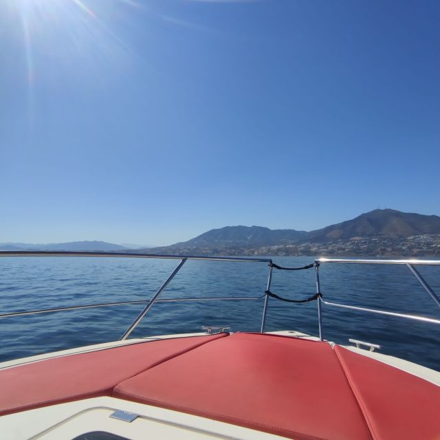 Fuengirola: Fantastic Dolphin Watching Yacht Tour with Drink - The boat setup: covered comfort plus open viewing
