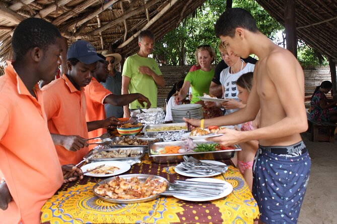 Full day Dolphin tour, Nungwi and Kendwa Beach Tour with Lunch - Nungwi village: dhow boat-building and the fish market