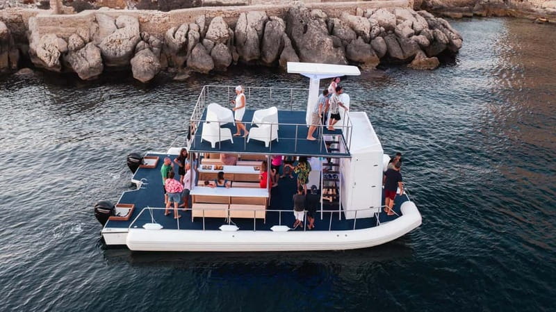 Giardini Naxos: Dolphin Catamaran Sunset Tour with Aperetif - Isola Bella and Taormina’s bay: the aperitif + swim combo that sells the night