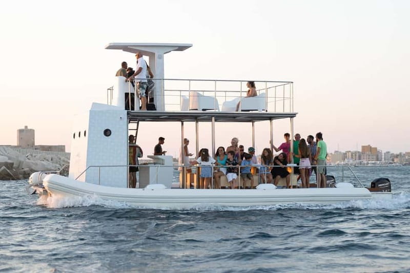 Giardini Naxos: Dolphin Catamaran Sunset Tour with Aperetif - The Coast of Myths stops: Cave of Love, Capo Taormina, and Blue Grotto views