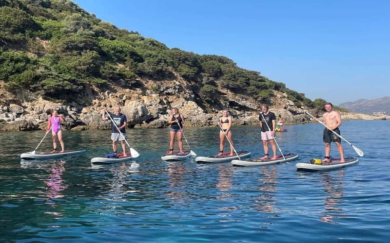 Golfo Aranci tour SUP Paddleboard Dolphin watching, aperitif - Dolphin watching (55 minutes): what you’re really doing for those close-up moments