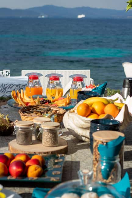 Golfo Aranci: traditional or transparent kayaks, dolphins, and aperitifs - Time of Day: Sunrise, Morning, Afternoon, or Sunset