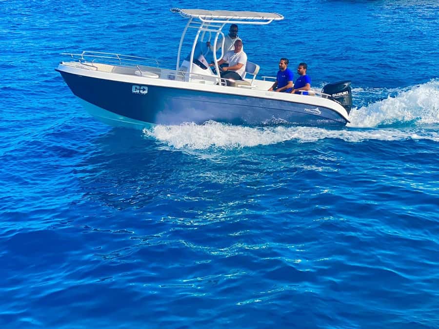 Hurghada: Orange Bay Dolphin Watching, Snorkeling & Lunch - Snorkeling at Two Spots Around Giftun Island