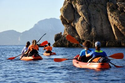 Kayak tour with aperitif and dolphins - Capo Figari vibes: that coast-only-by-water feeling