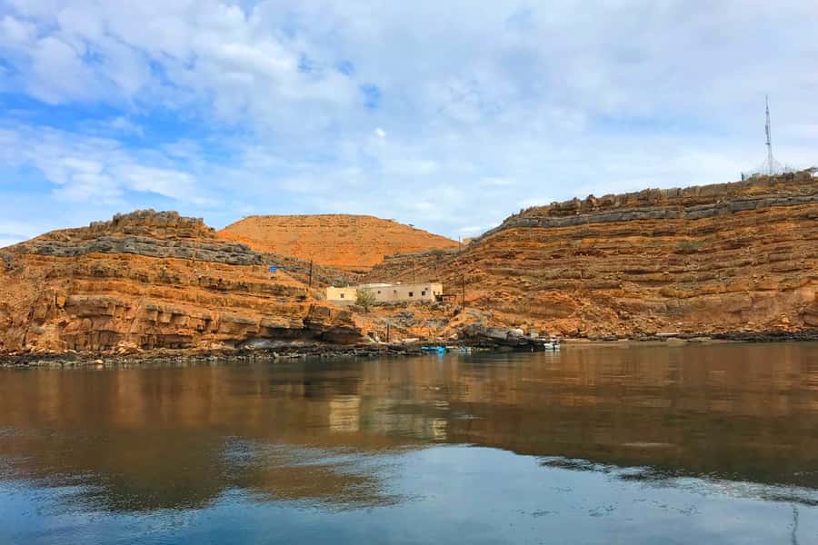 Khasab: Khor Sham Half-Day Cruise with Snorkeling & Dolphins - Boarding the traditional Omani dhow in Khasab