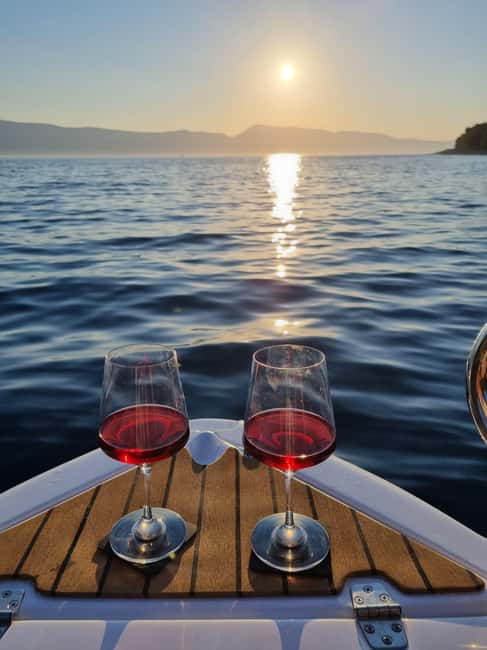Krk: Sunset Boat Tour with wine, high chance of dolphins - Key highlights you’ll feel right away
