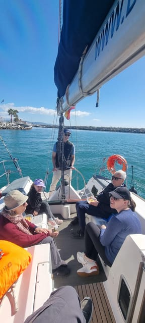 Marbella: Dolphin-Watching Sailboat Trip with Drinks, Snacks - What Happens During Those Two Hours at Sea