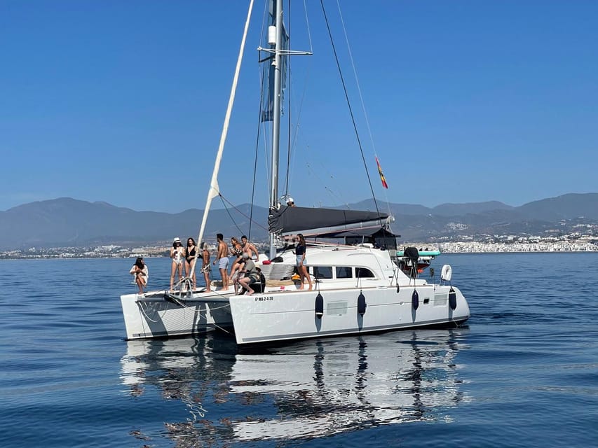 Marbella: Group Dolphin Watching Catamaran Tour with Snacks - From Puerto José Banús to the Open Water on Catamaran Daria