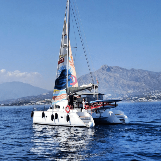 Marbella: Group Dolphin Watching Catamaran Tour with Snacks - Swimming and Water Toys When the Sea Allows It
