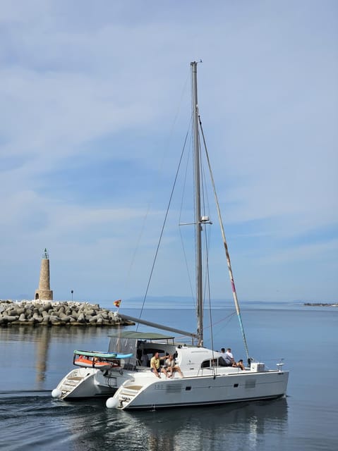 Marbella: Group Dolphin Watching Catamaran Tour with Snacks - Meeting Up Smoothly at Dior: The Logistics That Save Your Day