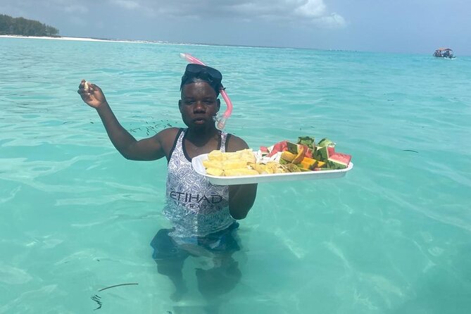 Mnemba Island snorkeling and Swimming with Dolphin - Food break on the beach: a small add-on that helps the day feel complete