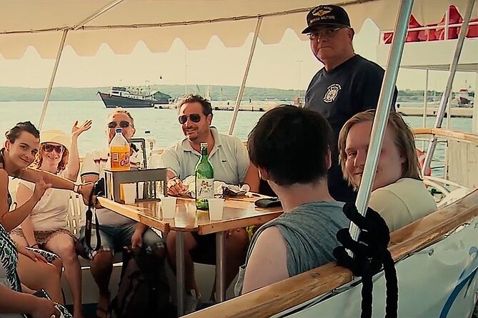 NP Brijuni Island Swimming & Dolphin Watching Sunset Cruise - Sunset at sea and Pula’s night glow: the part you remember