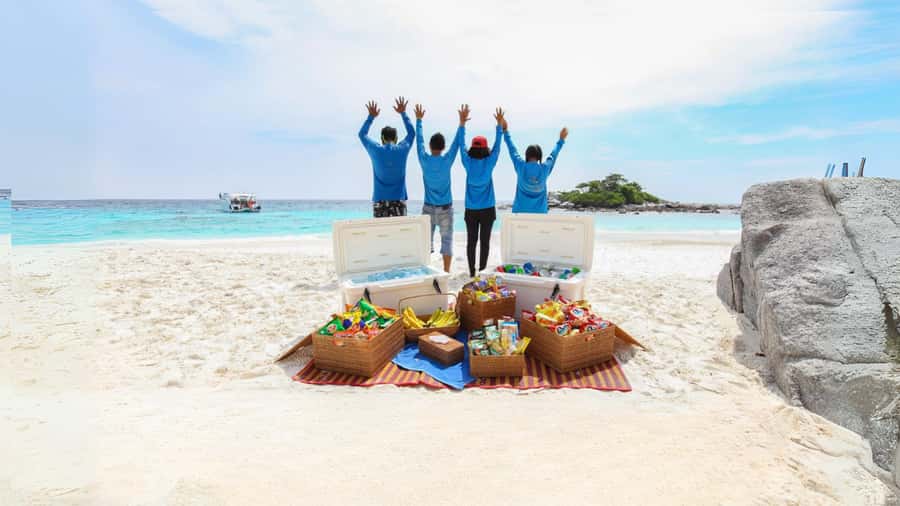Phuket: Raya Island, Maithon Island, & Dolphin Spotting Tour - Banana Bay snorkeling: the reef stop that earns its spot