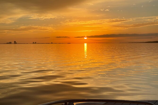 Private Boat and Dolphin Watching in Florida - A comfortable private boat built for the Pensacola Bay pace