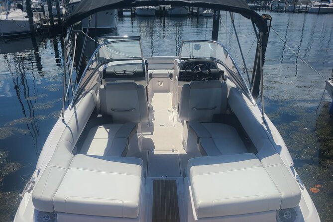 Private Boat: Island Cruise and Dolphins - Snorkel or Tube: Gear, Waves, and the Swim Ladder