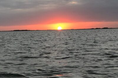 Private Dolphin Watch and Sunset Boat Tour Port Aransas Texas - Lydia Ann Lighthouse Stories and Sunset Photo Time