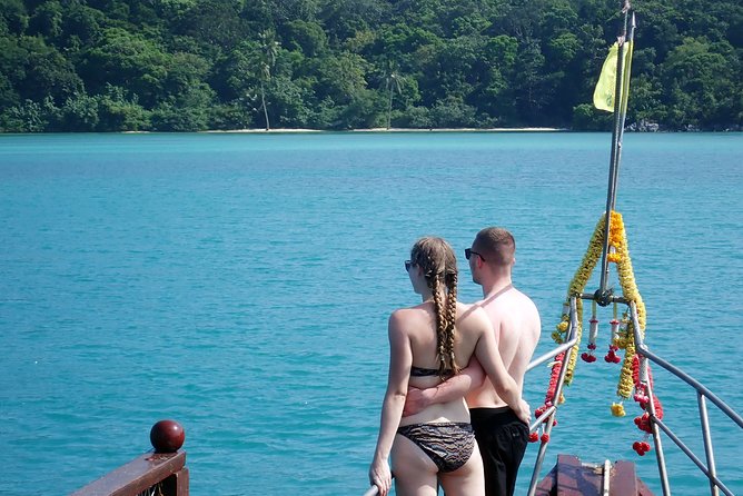 Private Full-Day Blue Dragon Yacht for Snorkeling Koh Tan & Visit Pink Dolphin - Ko Mae Thap: limestone cliffs, caves, and bamboo homes