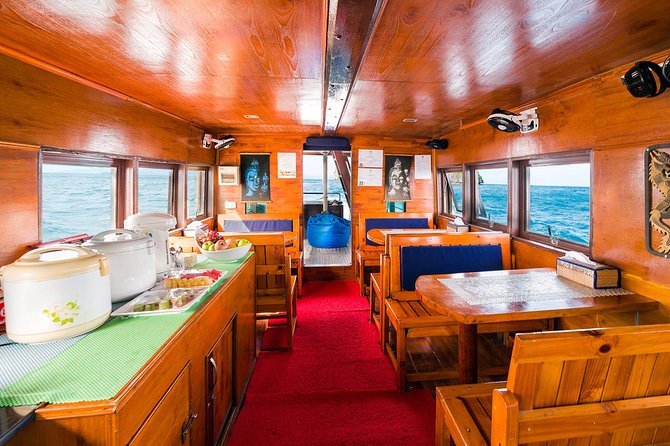 Private Full-Day Blue Dragon Yacht for Snorkeling Koh Tan & Visit Pink Dolphin - Ko Malaeng Pong: steep limestone peaks and a pristine beach gap