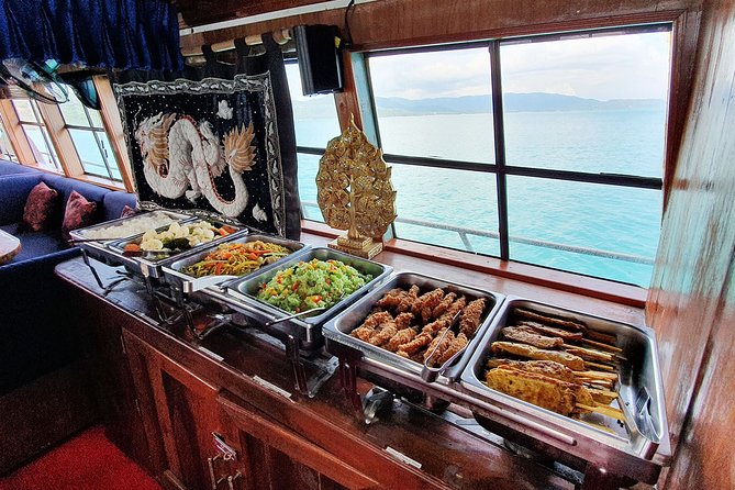 Private Full-Day Red Dragon Yacht for Snorkeling Koh Tan & Visit Pink Dolphin - The early cruise: Five Islands, bird nest White Gold, cliffs, and caves