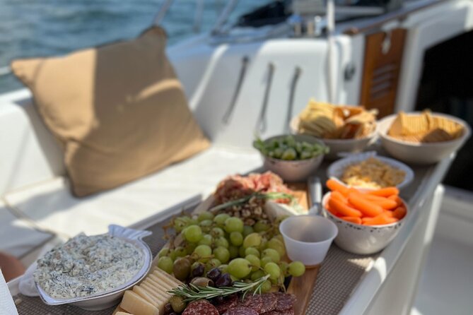 Private Morning Sail, Dolphin and History Tour on Mystique - The onboard experience: shade, restrooms, and a calm rhythm