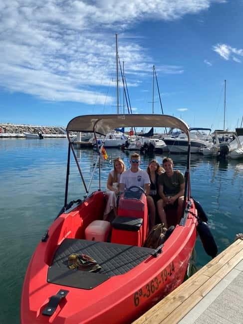 Puerto Banús: Private Cruise with Dolphins & Wakeboard - Snorkeling and swimming stops: cooling off in clear water