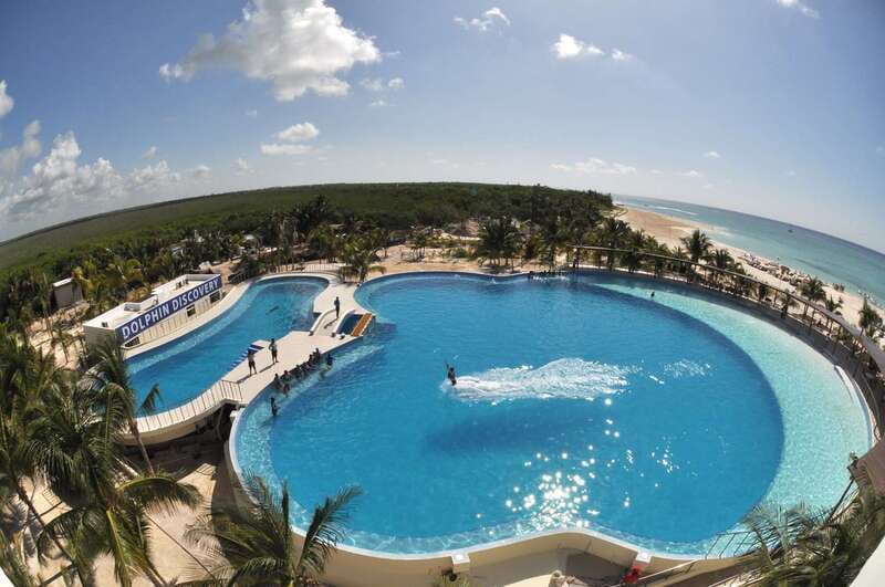 Riviera Maya: Dolphin Encounter with Beach Club Access - Real-world costs to budget for: photos, water, and restaurant extras