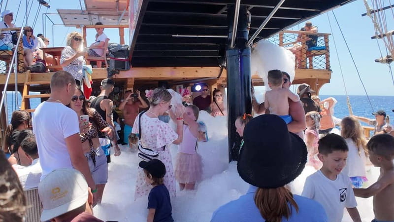 Side: Dolphin Boat Tour With Lunch Foam party Swimming - Dolphin Island and the Foam Party Moment