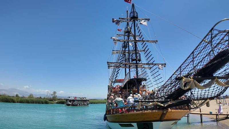 Side: Dolphin Boat Tour With Lunch Foam party Swimming - First Swim Stop with a Live DJ Soundtrack