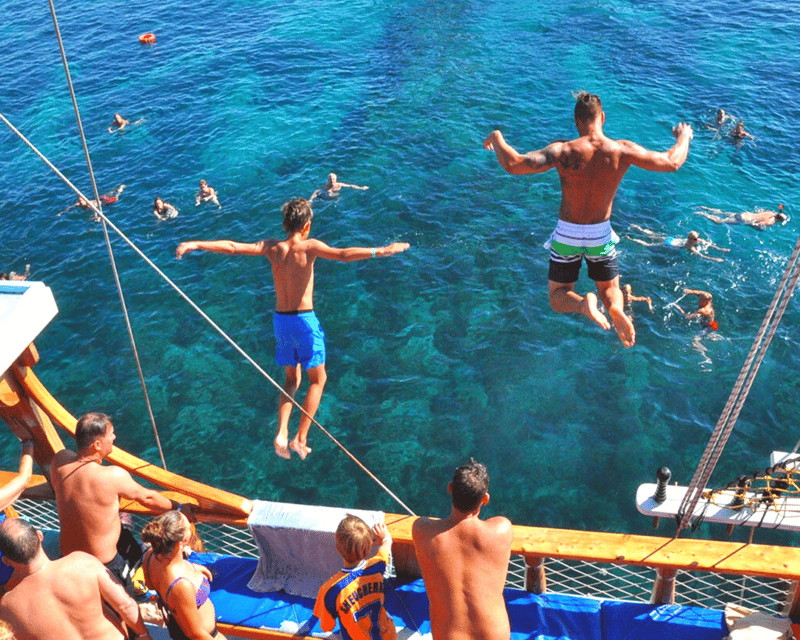 Side: Dolphin Island Boat Tour with BBQ Lunch - Lunch on Board: Grilled Chicken, Salads, and Rice