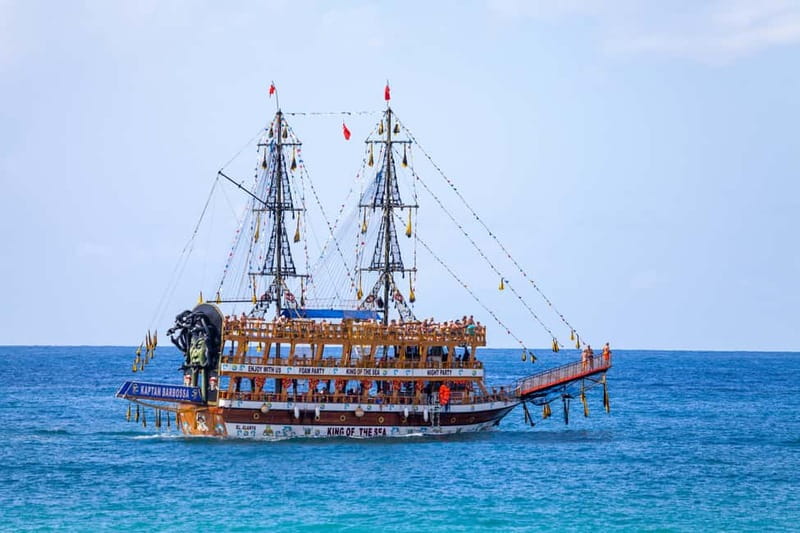 Side: Dolphins Island Cruise with Swimming Stops and Lunch - On the water: Shipyards, river turtles, and first real sea views
