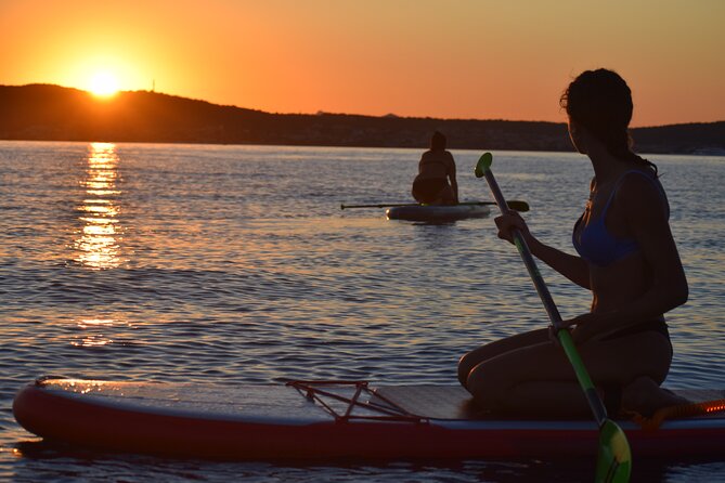 Stand Up Paddle With Dolphins, aperitif and pictures - Cala Moresca: swim time plus local nature talk