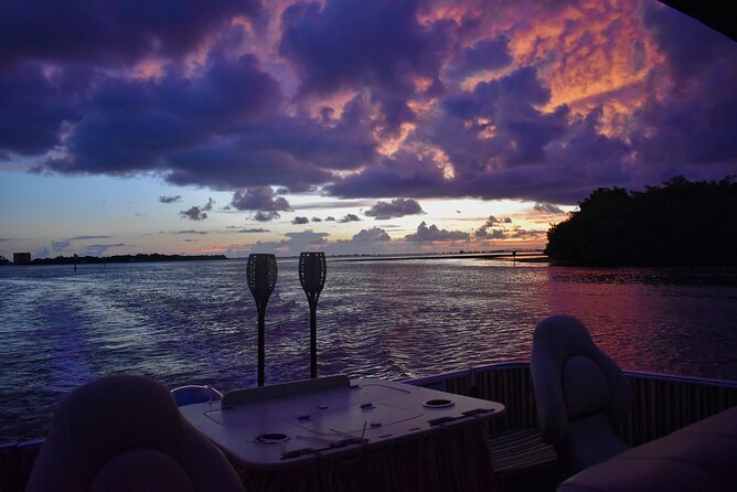 Sunset and Dolphin Cruise around Fort Myers Beach - Onboard vibe: stereo music, small-group comfort, and captain personalities