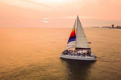 Sunset & Dolphin Catamaran Cruise with Island Time - Golden-hour dolphin watching in Grand Lagoon